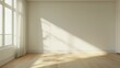Empty room with sunlight through window casting shadow on wall.