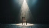 Fototapeta Koty - Single chair on stage under spotlight with dark background.