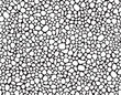 Seamless pattern of white pebbles arranged in a random organic pattern on a black background