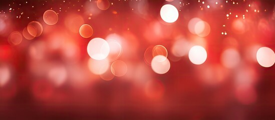 Fototapete - A beautiful red background with natural bokeh holiday lights perfect for design with copy space image