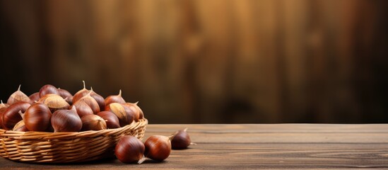 Poster - A copy space image showcases fresh sweet chestnuts on an old wooden table alongside a basket perfect for Christmas