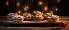 A Delicious Bunch Of Mince Pies Arranged On A Rustic Table With Plenty Of Empty Space For Photography. With Copy Space Image. Place For Adding Text Or Design