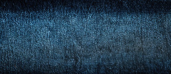 Wall Mural - a close up view of the intricate texture of blue denim fabric on a pair of jeans providing a perfect