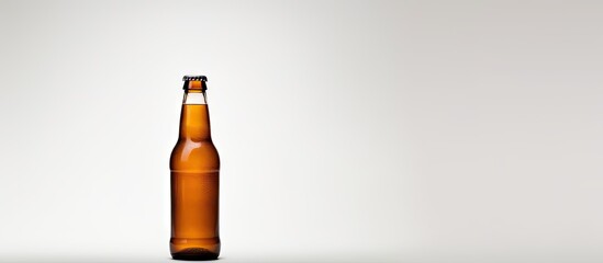 Aufkleber - A beer bottle is seen on a white background providing ample space for text or other elements to be added to the image