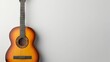 © volga - Classic acoustic guitar on a white background with copy space