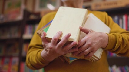 Wall Mural - close up a Pages of Wisdom Portrait of a Senior hands