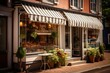 A Charming Small Town Bakery with a French-Style Striped Awning, Freshly Baked Goods Visible Through the Window