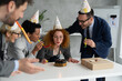 © Novak - Corporate people celebrate birthday at office