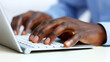 © Tony Baggett - Close-up of hands on a keyboard of a desktop computer or laptop being used by an office worker while working in a corporate business workplace, stock illustration image