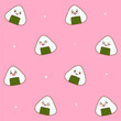 Seamless pattern with cartoon onigiri with happy faces - cute background with traditional japanese food