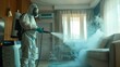 A person in full protective gear using a fogger to disinfect a modern living room.