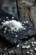Sea salt on rustic table, close up