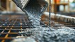 © Natalia - Close-up view of concrete being poured on steel reinforcement at a construction site.