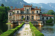 Architectural fantasy: antique luxurious villa in Renaissance baroque style at the border of a tranquil mountain lake