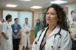 © AI_images - A Hispanick female doctor, with a commanding presence, standing in front of a team of doctors, engaged in discussions about patient diagnoses.
