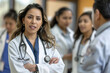 © AI_images - A Hispanick female doctor, with a commanding presence, standing in front of a team of doctors, engaged in discussions about patient diagnoses.