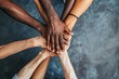 © Lucija - diverse hands stacked together symbolizing unity solidarity and teamwork social issues concept