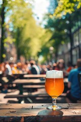 Sticker - A glass of beer on a rustic wooden table, suitable for pub or brewery themes