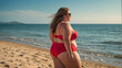 Fat woman in a swimsuit on the beach