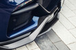 Modern sport car carbon front bumper lip, spoiler, and splitter