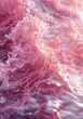 Pink ocean waves crashing on a beach