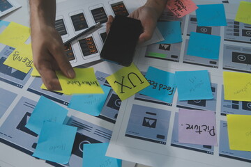 ux Graphic designer creative sketch planning application process development prototype wireframe for web mobile phone . User experience concept.