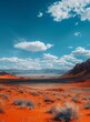A Stunning Landscape of Red Sand Dunes and Mountains