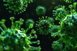 green virus cells in a dark background