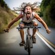 Crazy Man with long hair rides bike on road, wearing shorts