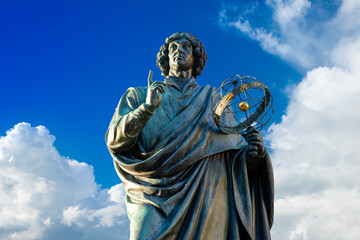 famous statue of astronomer a nicolaus copernicus (mikolaj kopernik) in torun. poland