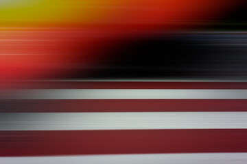 Wall Mural - Abstract blurred background, horizontal black, orange, white, red stripes.