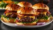 © Pixel Skull Design - Three gourmet bacon cheeseburgers with lettuce and onions, served on a dark surface.