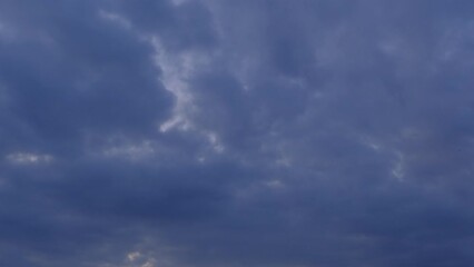 Poster - Dramatic sky with storm cloud on a cloudy day time lapse.