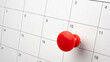© MAITREE - Red color pin thumbtack a date 10th calendar or planner. Final Day takes place deadline 10 day Friday.