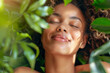 A woman is smiling and looking at the camera while surrounded by green leaves. Natural Beauty Moments. Promoting a connection between beauty and nature, Ideal for eco-friendly skincare advertising
