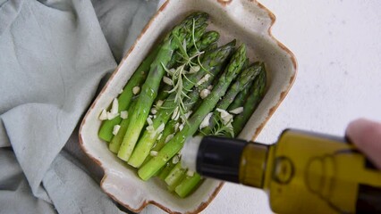 Wall Mural - Freshly cooked asparagus appetizer in ceramic baking dish