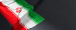 Flag of Iran. Fabric textured Iran flag isolated on dark background. 3D illustration