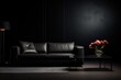 © crazyass - Dark luxury interior with a black leather couch and a vase of flowers.
