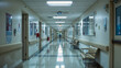 Modern Hospital Corridor with a Lone Healthcare Worker Walking Away