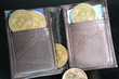 wallet with crypto currency gold coin bitcoin and credit card black background 