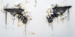 Two black painting wings on a white wall. Grunge and graffiti style. Design element