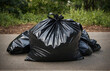 black garbage bags on the street