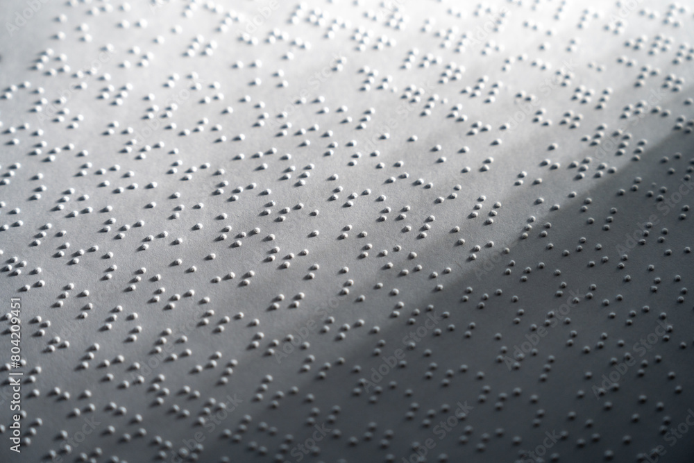 Close up some braille text on page paper written by blind. Blind man ...