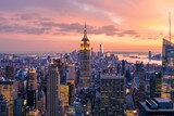 Fototapeta  - Empire State Building and New York City skyline in the evening.