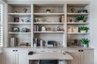© Ilia Nesolenyi - A sleek and organized home office featuring built-in shelving units and a desk for workspace efficiency
