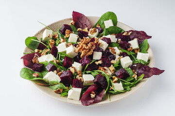 Wall Mural - delicious fresh beet salad on a white background