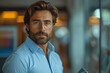 © btiger - Modern Indian Entrepreneur with Digital Tablet in Office Space