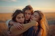 © Dina - three young caucasian female friends hugging in nature with beautiful light at sunset. Women supporting each other. Girl power.