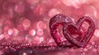 Close-up of two intertwined hearts crafted from delicate pink glitter, set against a radiant, glossy background.