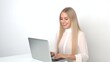 © we360designs - Woman Using Laptop at Desk